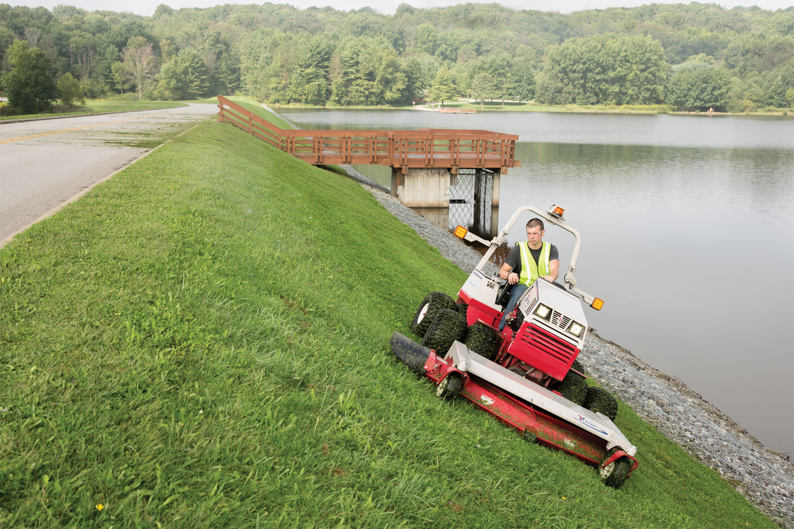 ventrac steep slope mowing hillside mow mowers slopes hills side cut deck 2395 advantages creek dual attachments