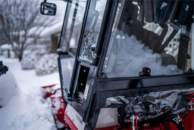 Ventrac KW452 Cab - The Cab stays secure allowing now snow or rain to get in. 
