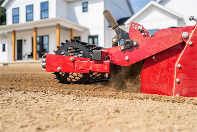 Ventrac Soil Cultivator - The Soil Cultivator is PTO driven and has broad tines for processing high volumes of soil.