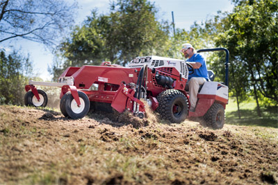 Ventrac Power Rake - Soil and stone can be carried forward or backwards with the reversible drum. 
