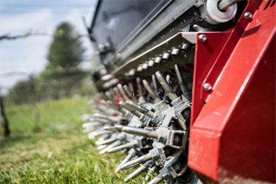 Ventrac Aera-Vator - Aerate and overseed at the same time with the optional seeder accessory.