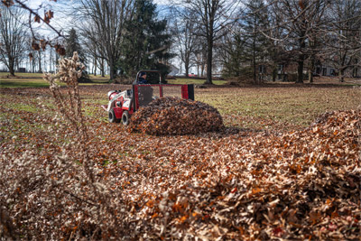 Ventrac Leaf Plow - Once you blow the leaves into a windrow, use the Ventrac Leaf Plow to move piles to the desired location without leaving the seat of your tractor.