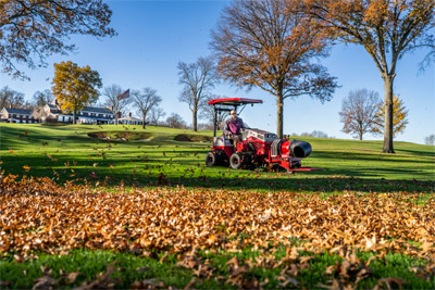 Ventrac Turbine Blower - Effortlessly clearing the way for pristine greens – Ventrac Turbine Blower in action, gracefully sweeping autumn leaves off the golf course fairway.