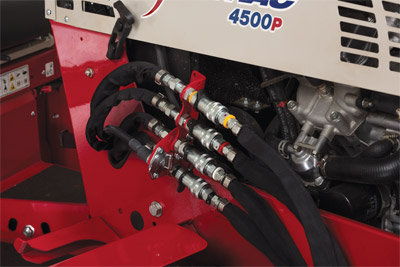 Closeup of Front Hydraulic Aux Kit Hose Assembly - Optional kit that adds two more hydraulic ports to allow for more functions for certain attachments on the front of the Ventrac. 