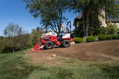 Ventrac Power Bucket - Spread and level topsoil all with one attachment.