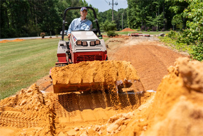 Ventrac Power Bucket - Easily move tons of sand to the areas on the course that need it.