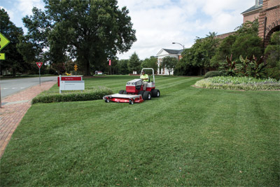 HM722 Complete Mower Deck on Ventrac 4500 compact tractor - Shown with optional dual wheels for added stability and a softer footprint. 