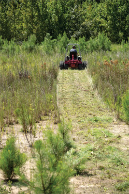 Ventrac 4500 Clears a path with the HQ680 - The advantage of front-mounted deck is the ability to clear a path in front of the tractor making it easier to maneuver and does not trample the vegetation before it gets cut.