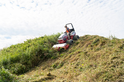 Ventrac Tough Cut - For easier cleaning access, a hydraulic flip-up kit is available.