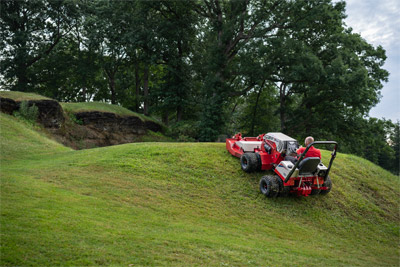 Ventrac 4520 - The Ventrac 4520 expertly navigates the slopes and tough terrain of a golf course, ensuring efficient mowing. Engineered with a low center of gravity, dual wheels, and a flex frame, it provides unmatched stability on slopes up to 30 degrees.