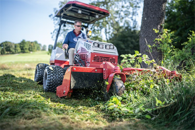 Ventrac Tough Cut - Clean up tall grasses to reclaim hilly areas.