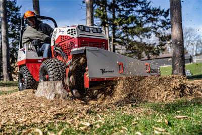 Ventrac Stump Grinder - The new material blade which is operated by the hydrostatic hand controls, helps push debris away from the working area so the operator can see more of the stump. 