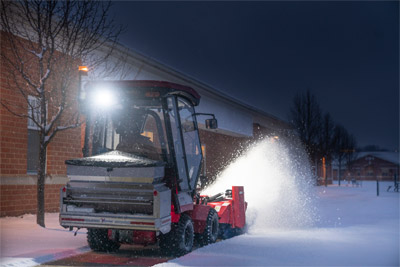 Ventrac Narrow Power Broom - Clearing off sidewalk with Ventrac's Power Broom. 