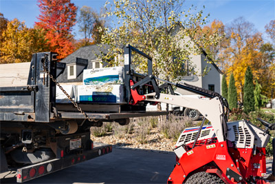 Ventrac KM410 Pallet Forks - The Ventrac KM410 Pallet Forks make loading and unloading material effortless, with 50 inches of ground clearance and adjustable fork width for secure handling of various loads.