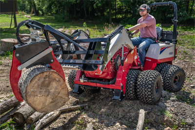 KM300 Log Grapple - Ventrac Log Grapple in action – effortlessly lifting and organizing logs, turning a cluttered pile into streamlined efficiency for property maintenance with ease.