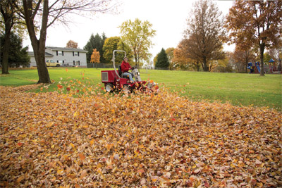 Ventrac 3400L with Power Blower - The blower housing can be rotated 180 degrees with the standard hydraulic motor. This allows the operator to move debris in the desired direction without hindering operation. Two gauge wheels maintain a consistent distance from the surface. Commercial leaf removal equipment made for you.