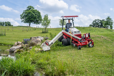 Ventrac Boom Mower - Easily maintain obstructed areas that are harder to reach.