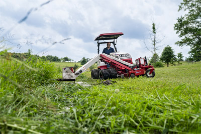 Ventrac Boom Mower - Tame the tall grasses by culverts and ditches.