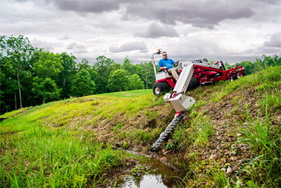 Ventrac Boom Mower - Hard to reach places are no problem for the Boom Mower.
