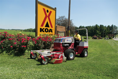 Ventrac 4500 using the MC600 60 inch Mower Deck - The out front mounted mower deck attachment allows you to get closer to shrubs, flower beds, and other landscaping without damaging them.