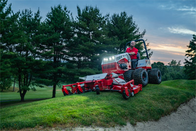 Ventrac Contour Mower - Navigating around sand traps with ease, the Ventrac Contour Mower's 83-inch width and flexible decks ensure a pristine finish on golf course bunkers. Full rear rollers and a flip-up deck design provide even cutting and efficient maintenance.