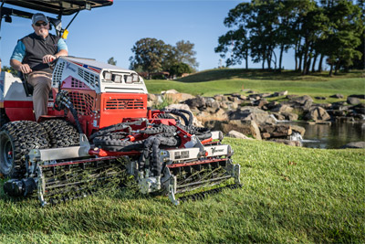 Ventrac Reel Mower - Navigating along golf course water features, the Ventrac MR770 Reel Mower delivers a precise cut with its 77-inch width and all-wheel drive capabilities. Engineered for steep slopes and variable conditions, it ensures a pristine finish on every pass.