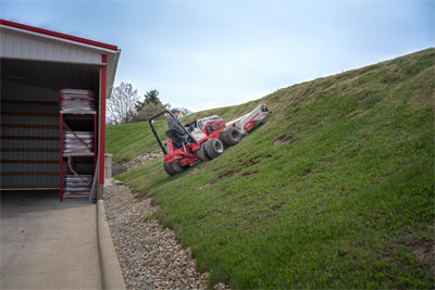 Ventrac Finish Mower - The Ventrac Finish Mower taking on a steep hill that would normally require string trimmers. With its unmatched slope capability, Ventrac handles tough angles with ease—delivering a clean, even cut where other brands can’t.