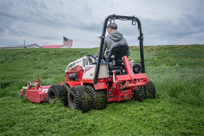 Ventrac Flail Mower - The Ventrac Flail Mower cutting through overgrown grasses, chopping and processing the material for a clean, refined finish. Perfect for tackling thick vegetation, the Flail Mower leaves behind a smooth, even cut, transforming unruly landscapes into well-maintained areas.