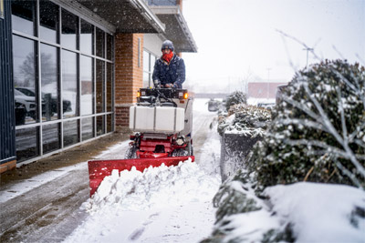 Ventrac Snow Plow - The Ventrac Snow Plow has the ability to operate at a +/-30° angle allowing the operator to push snow one way or another.