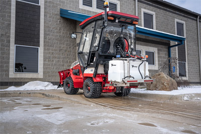 Ventrac Brine Kit - The Ventrac Brine Kit delivers precise liquid de-icing on sidewalks, utilizing its 35-gallon tank and integrated controls to maintain safe and clear walking surfaces.