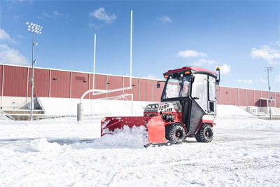 SP720 Box Plow - The Ventrac Bow Plow equipped with the turf edge used to clear a football field.