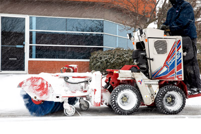 NJ380 Snow Broom - The NJ380's ability to angle makes it easier to clear off narrow patches of sidewalk. 